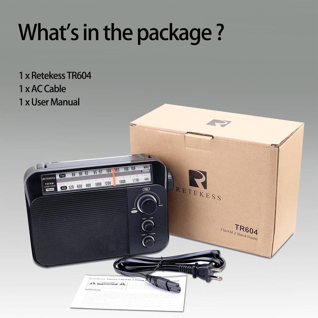 Portable AM/FM radio with AC cable and user manual next to the product box