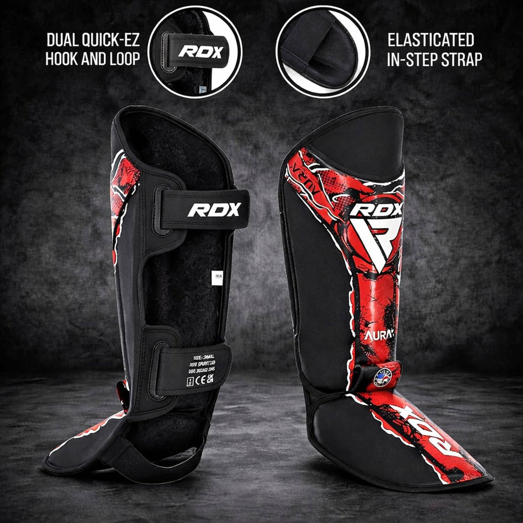 RDX shin instep kickboxing pads, black with red graphic trim and hook-and-loop closure