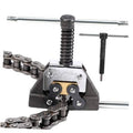 Roller chain detacher tool with spring-loaded press and handle rods