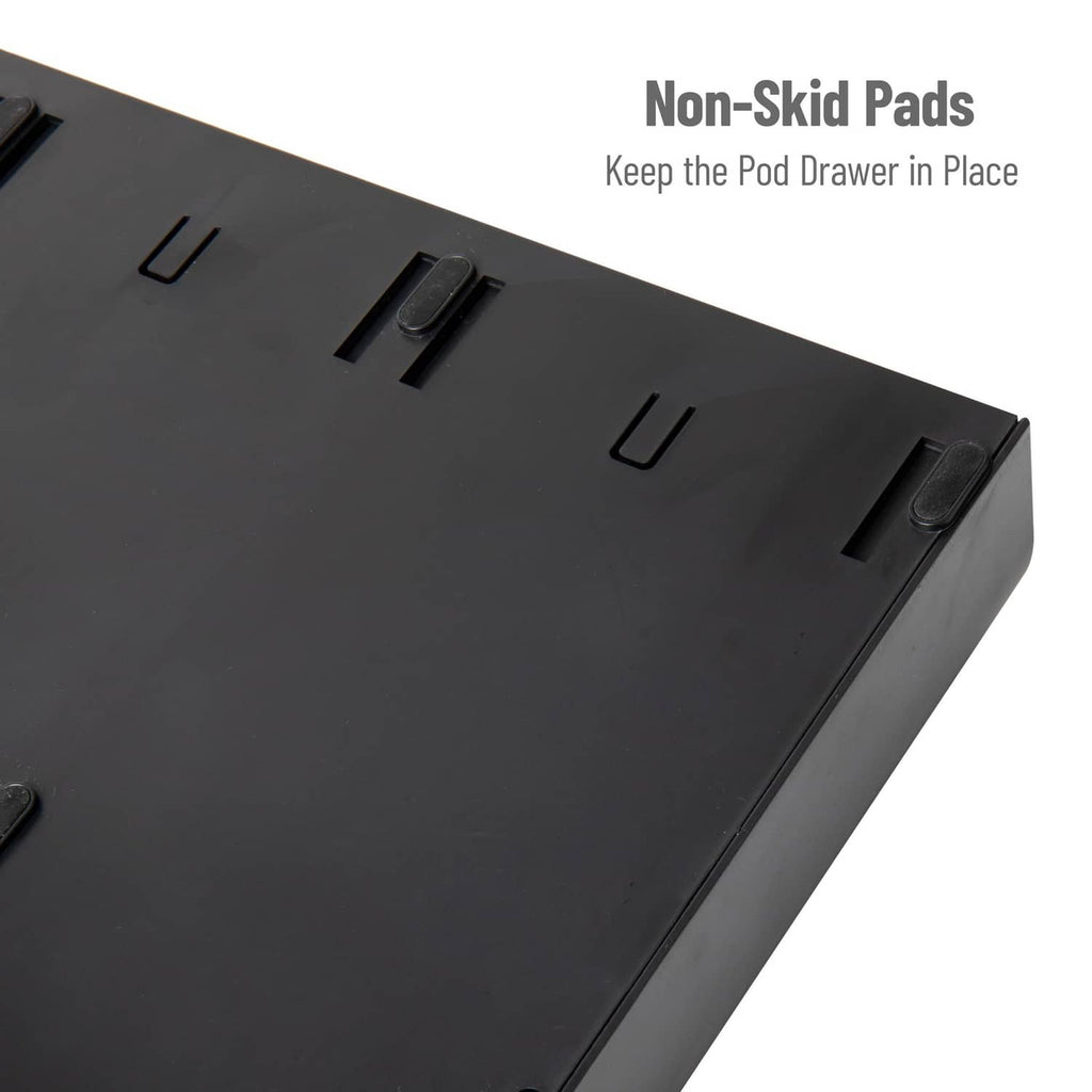 Black organizer drawer with non-slip pads detail on top surface