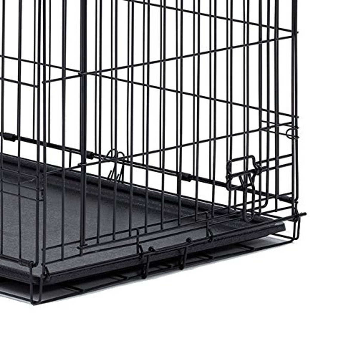 Dog crate with dark replacement pan tray installed along the bottom
