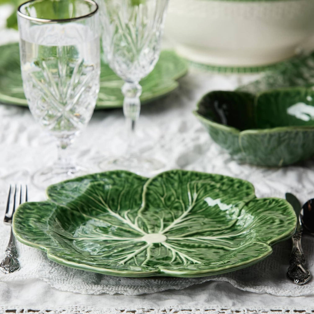 Green cabbage-pattern dinner plates, set of four; one plate shown with white veins.