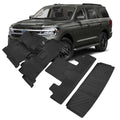 Black rubber full set floor mats with molded grooves and raised ridges
