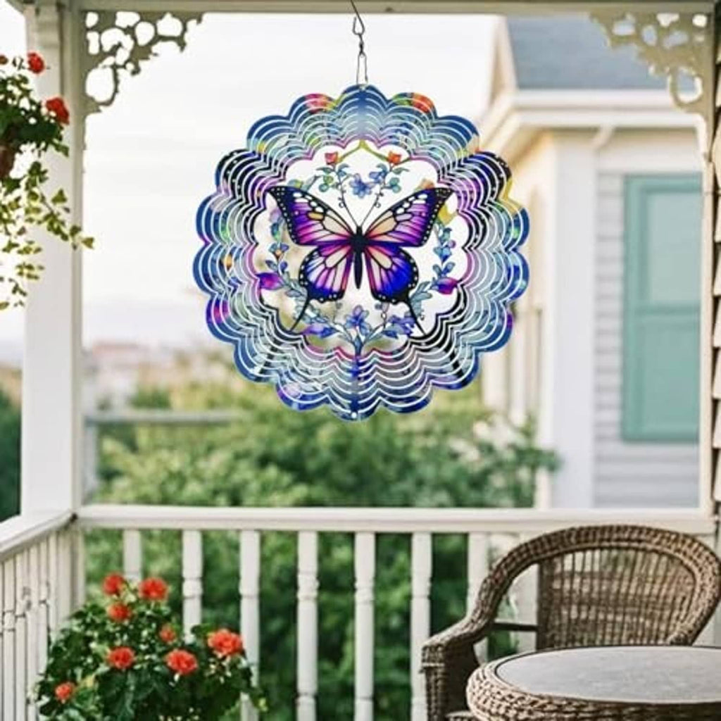 Butterfly wind spinner with blue scalloped rings and metal hanging chain.