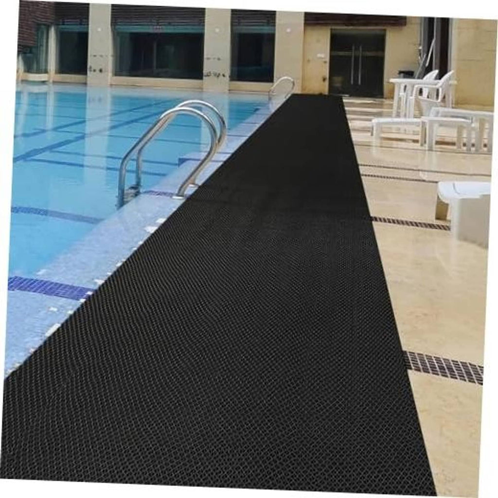 Pool deck floor mat runner with textured, non-slip diamond grid surface along pool edge