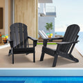 Set of 2 black folding Adirondack patio chairs with slatted backs and armrests, side view