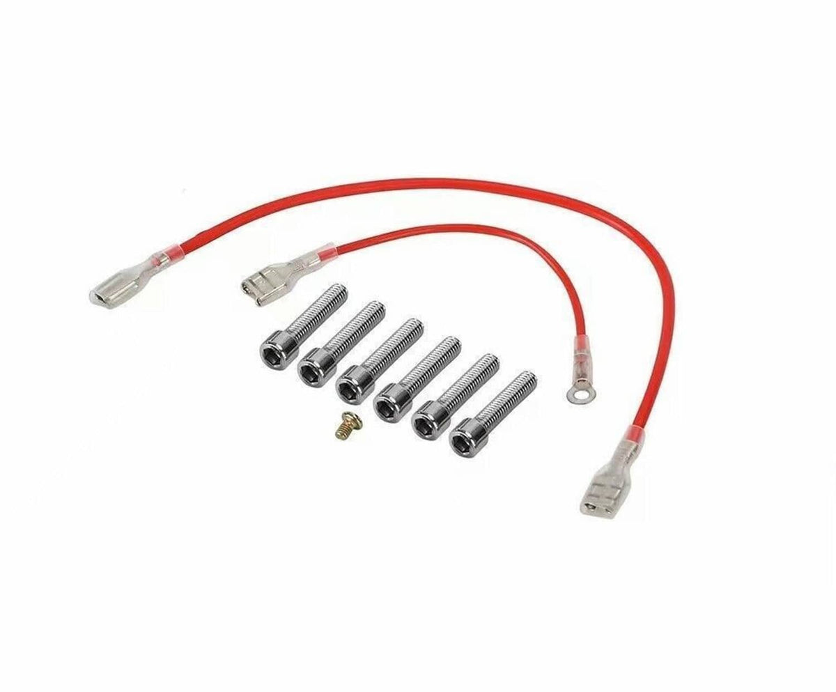 Steering wheel hub adapter components set with red wiring, terminals, and mounting screws