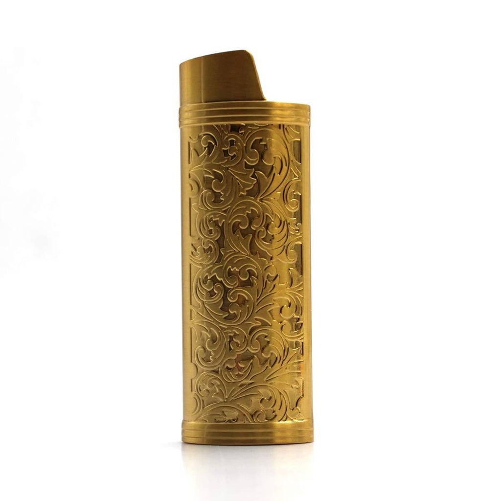 Gold metal lighter case with vintage floral embossing and textured flip top