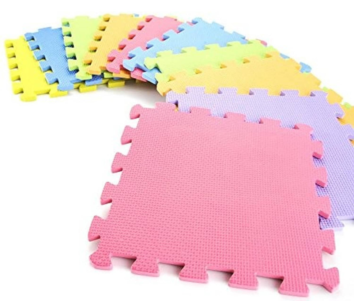 Stacked interlocking foam play mat tiles in pink, purple, blue, yellow, and green