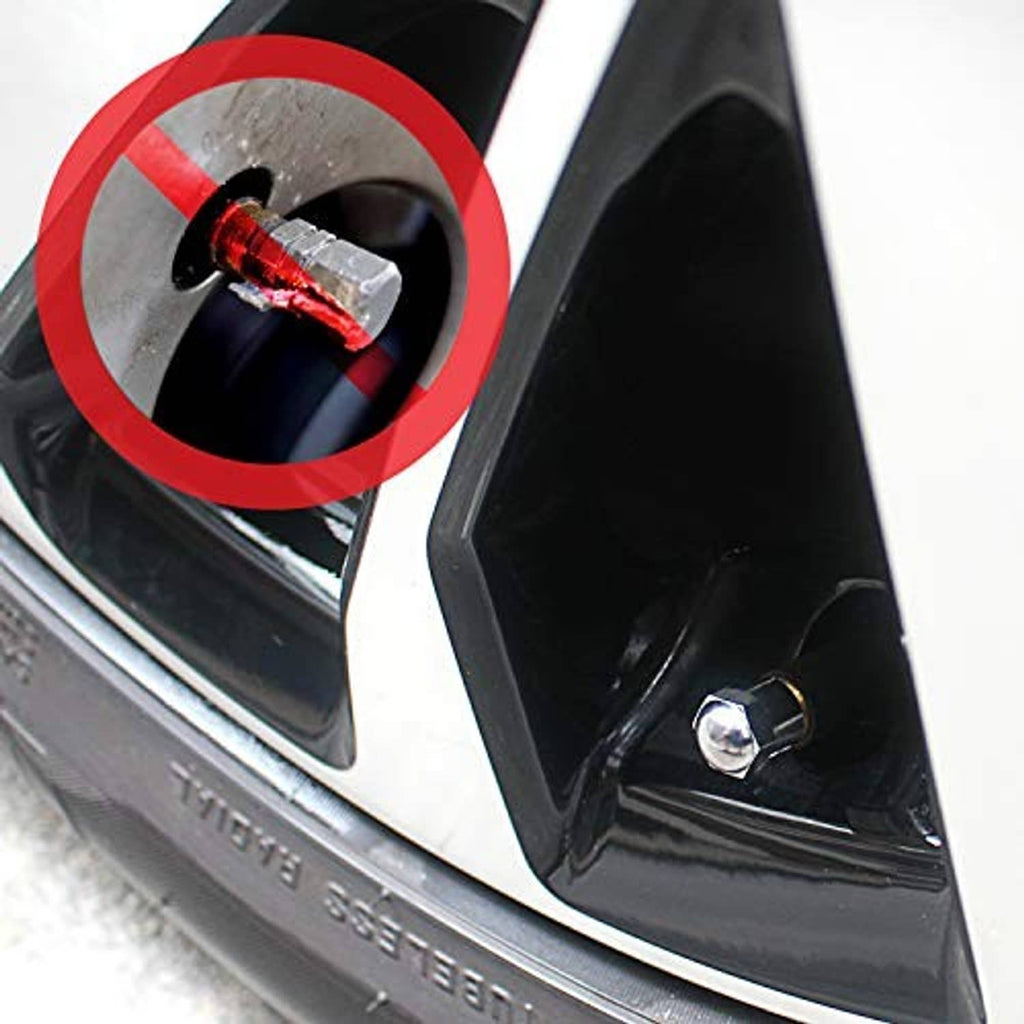 Tire valve stem cap installed on wheel valve, chrome cap with red rubber seal