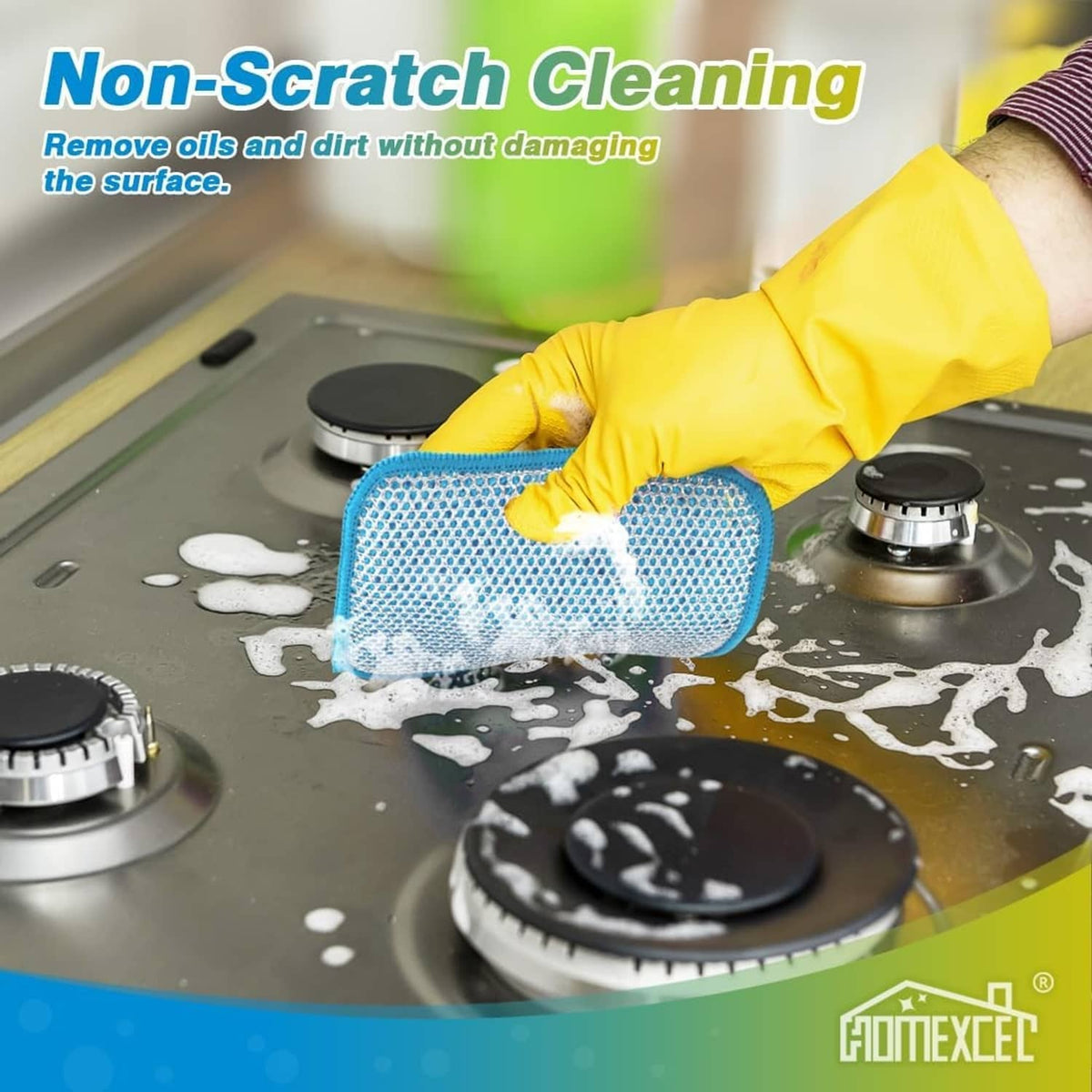 Blue wire non-scratch scrub pad wiping a stovetop with cleaning foam