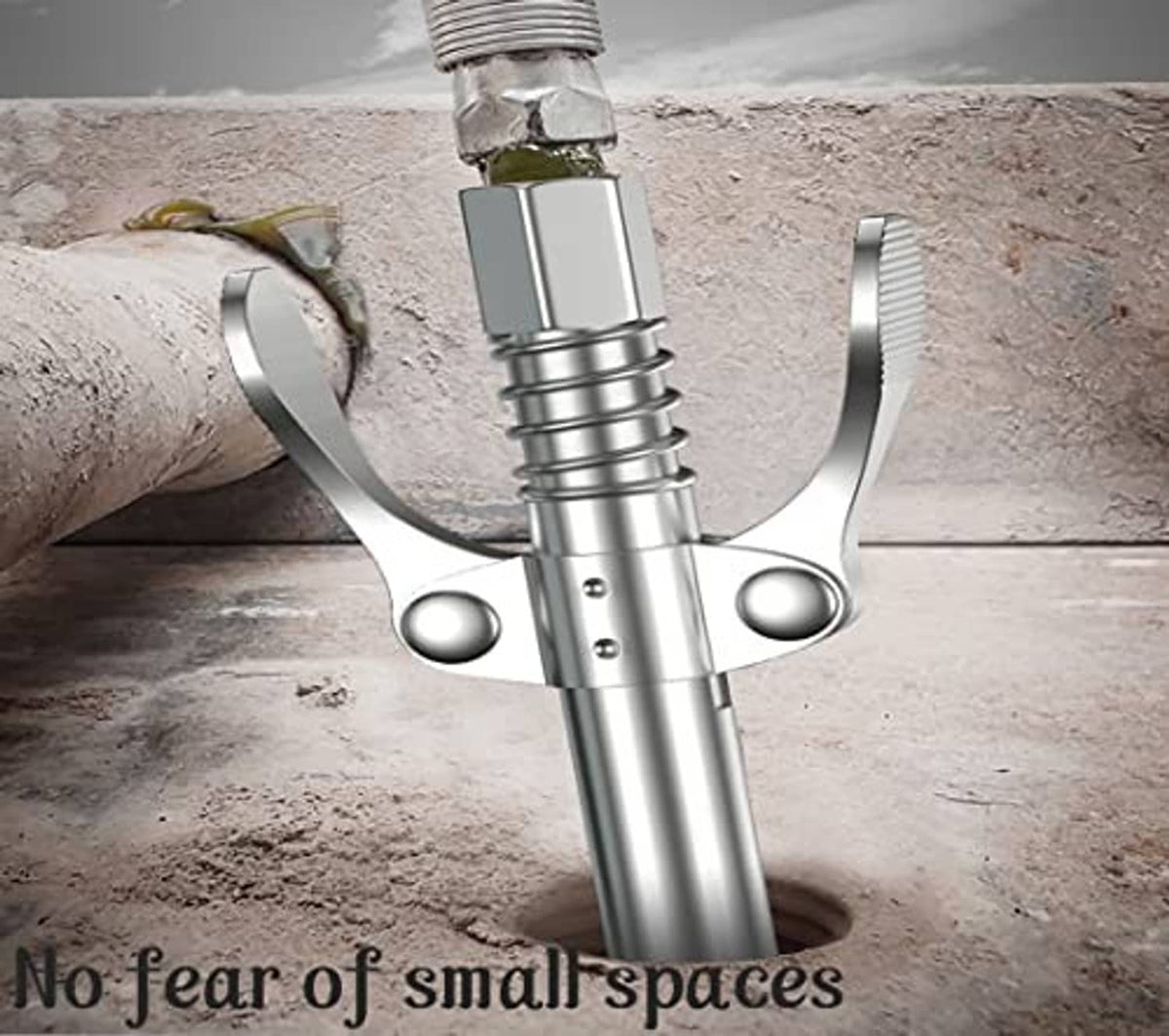 Grease gun coupler attached to a grease fitting on a steel pipe, metal spring grip
