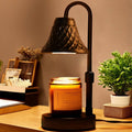 Black adjustable candle warmer lamp with arched frame and domed shade