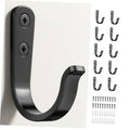 Black U-shaped metal wall hook with two screw holes; includes mounting hardware pieces