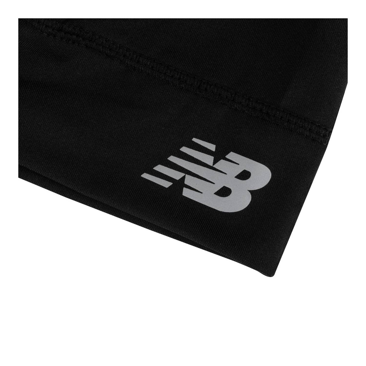 Black skullcap hat with New Balance logo on front band