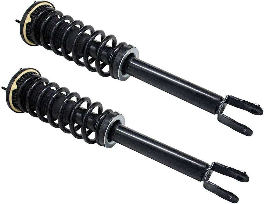 Pair of front shock struts with black coil springs and eyelet brackets