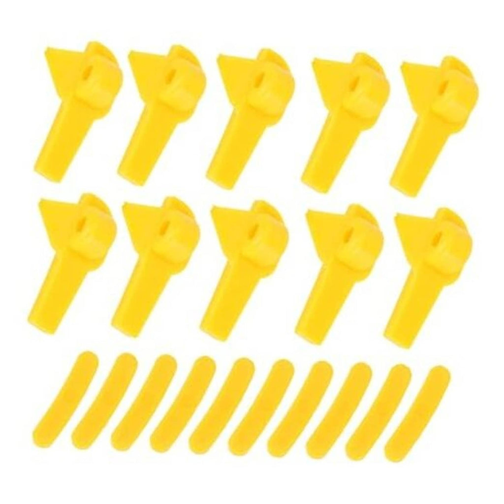 Yellow tire changer demount head protector tips laid out, 20-piece set, plastic