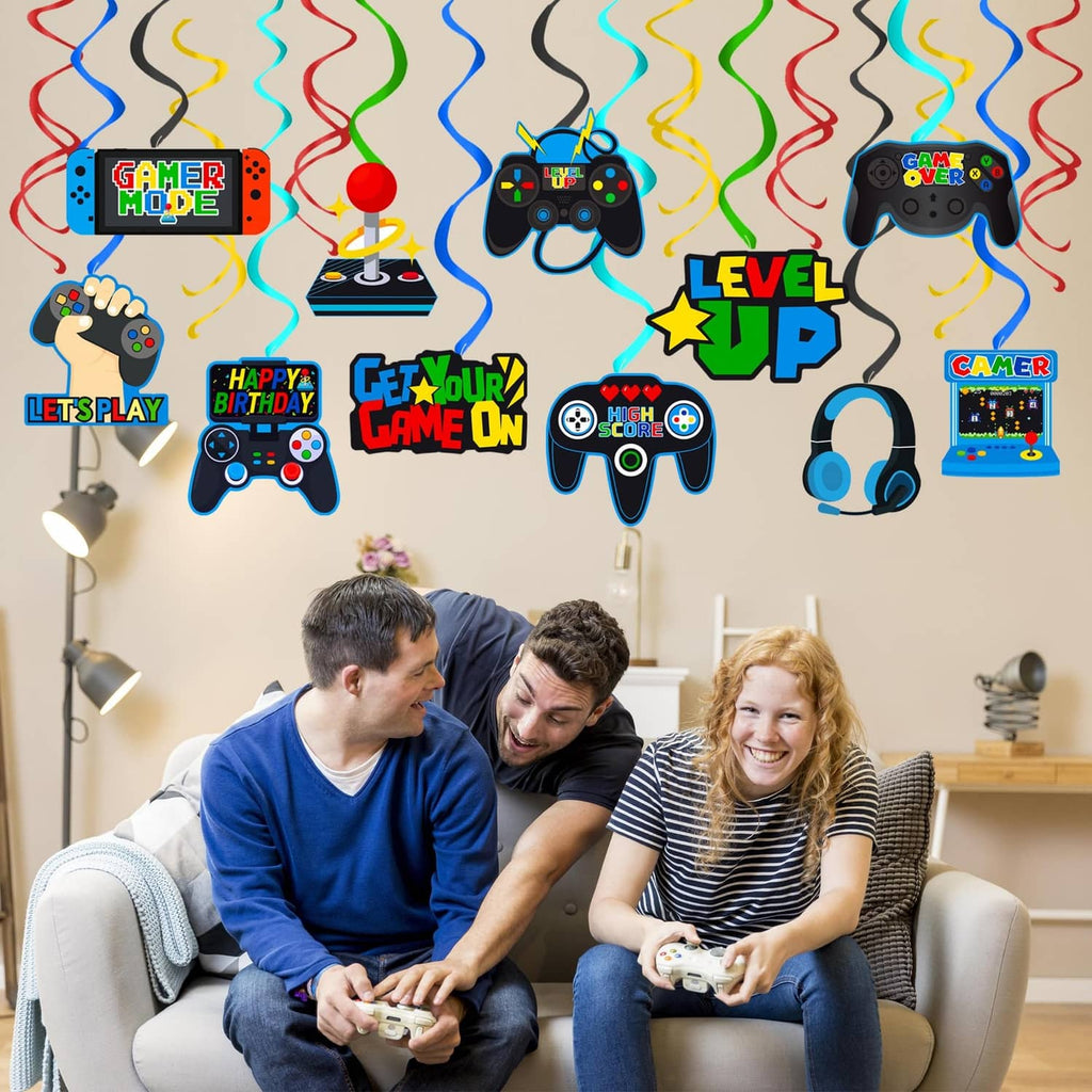 Blue video game hanging swirl party decorations with controller, headset, and 'Level Up' cutouts