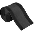 Black carpet cord cover cable protector, rolled for covering floor cables