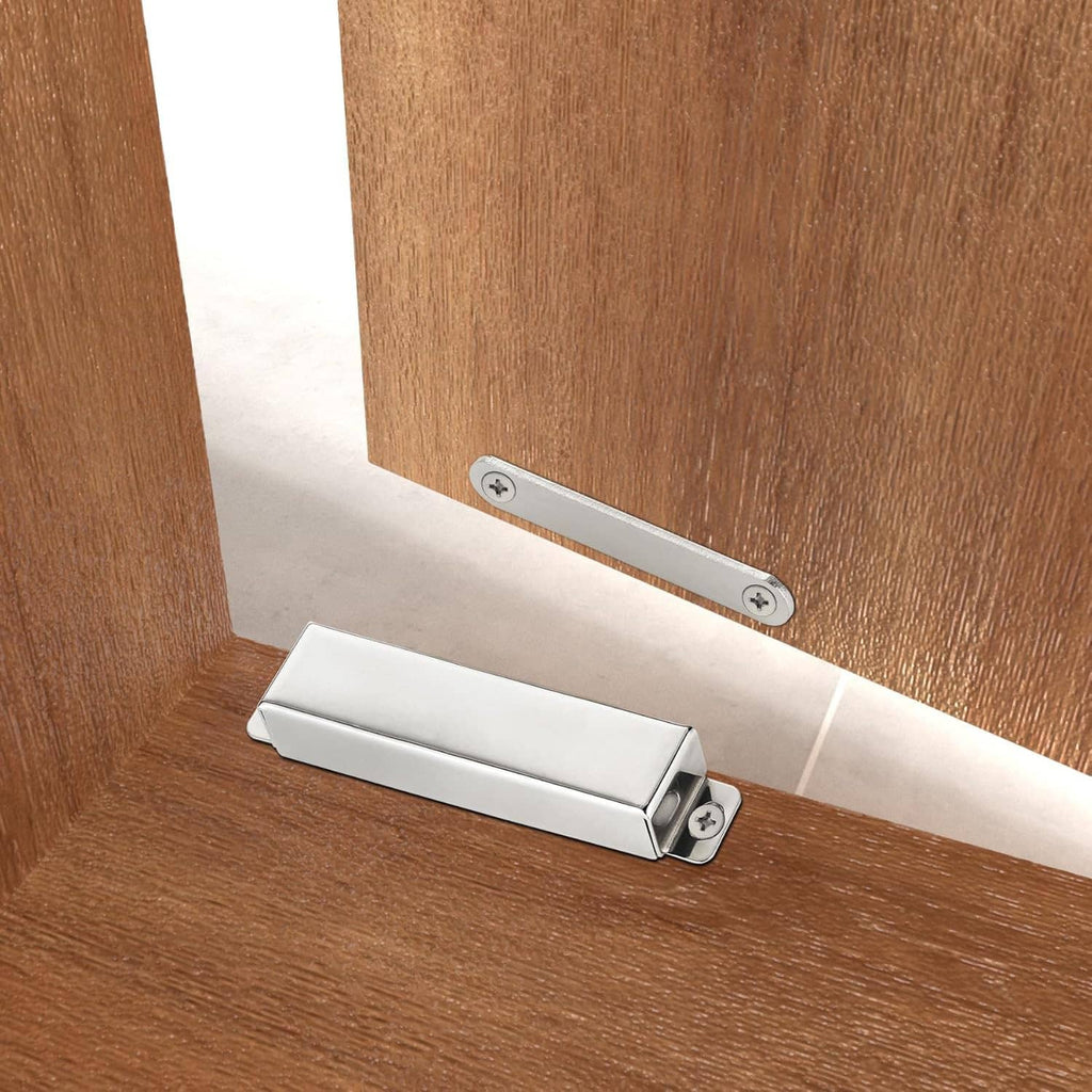 Stainless steel magnetic door catch with strike plate mounted across a door gap