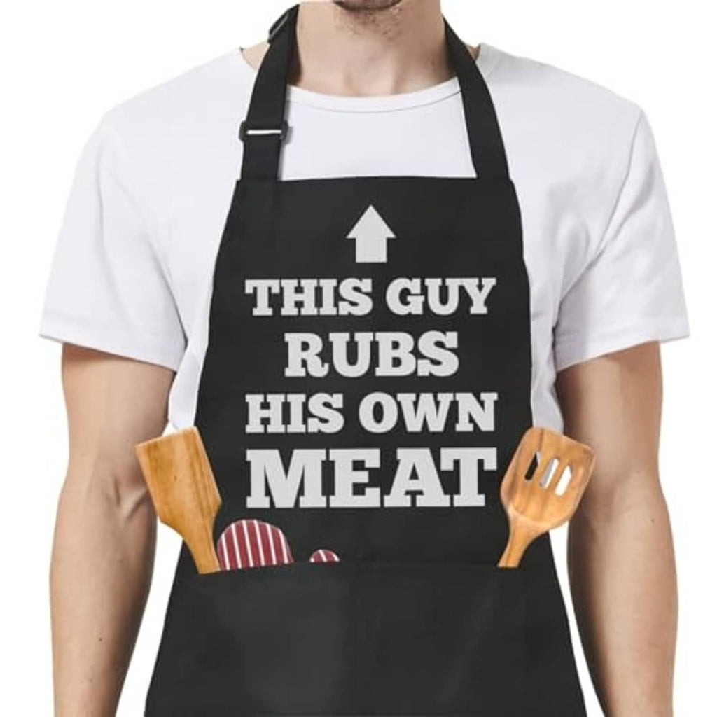 Black apron with 'THIS GUY RUBS HIS OWN MEAT' print and front tool graphic