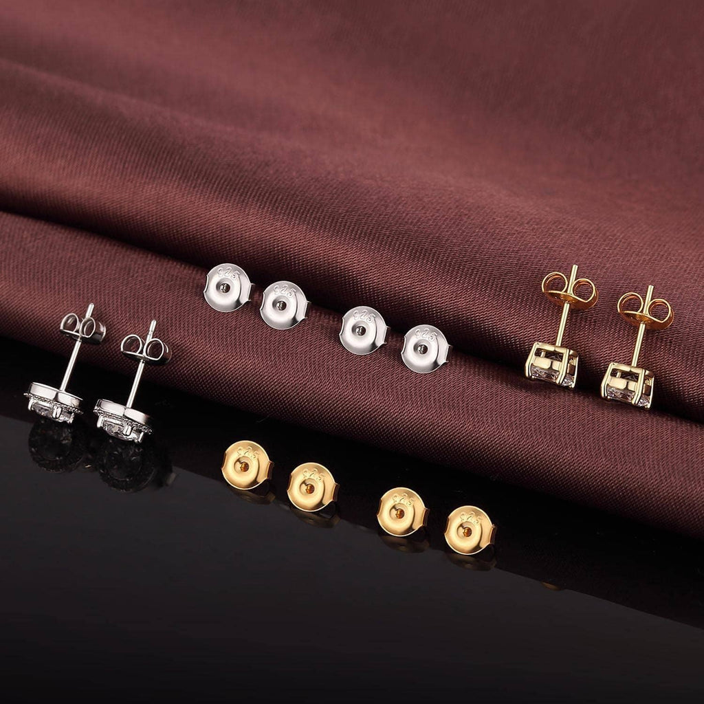 Assorted earring back replacements with small posts in silver and gold tones