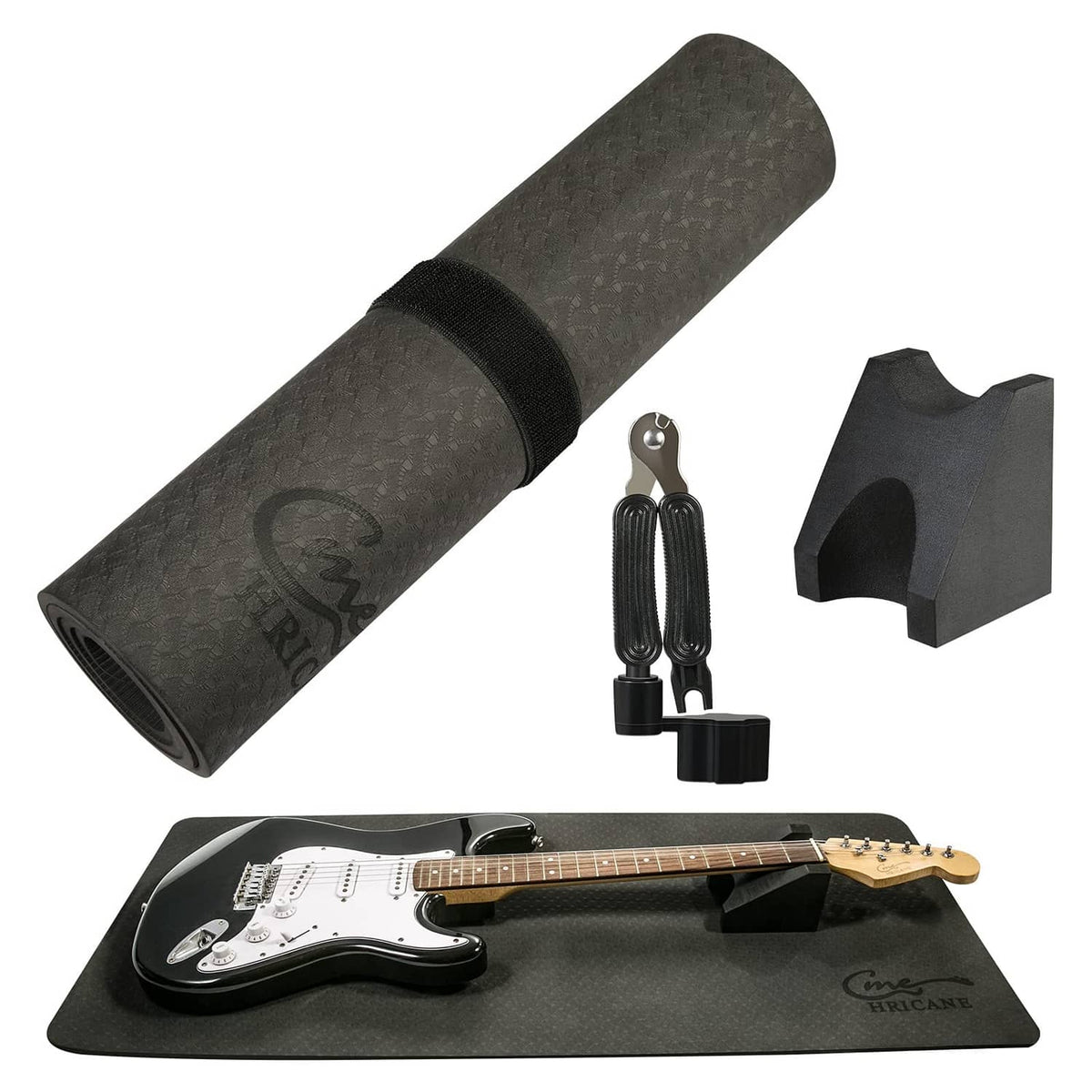 Rolled black guitar work mat with two neck rests and included guitar tools