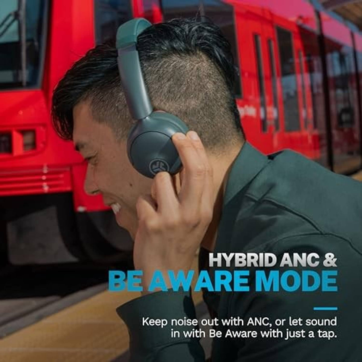 On-ear wireless headphones worn on a person’s head, hand adjusting an earcup