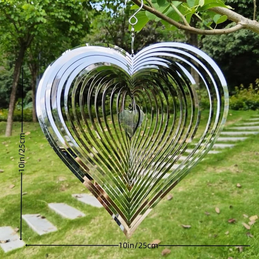 Heart wind spinner with concentric metal rings and hanging chain, reflective silver