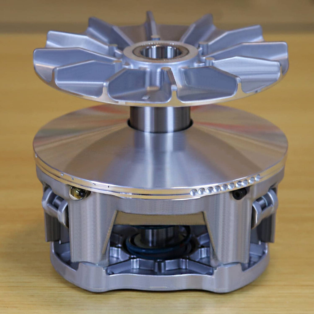 Silver primary drive clutch kit open view with central hub, fins, and internal components