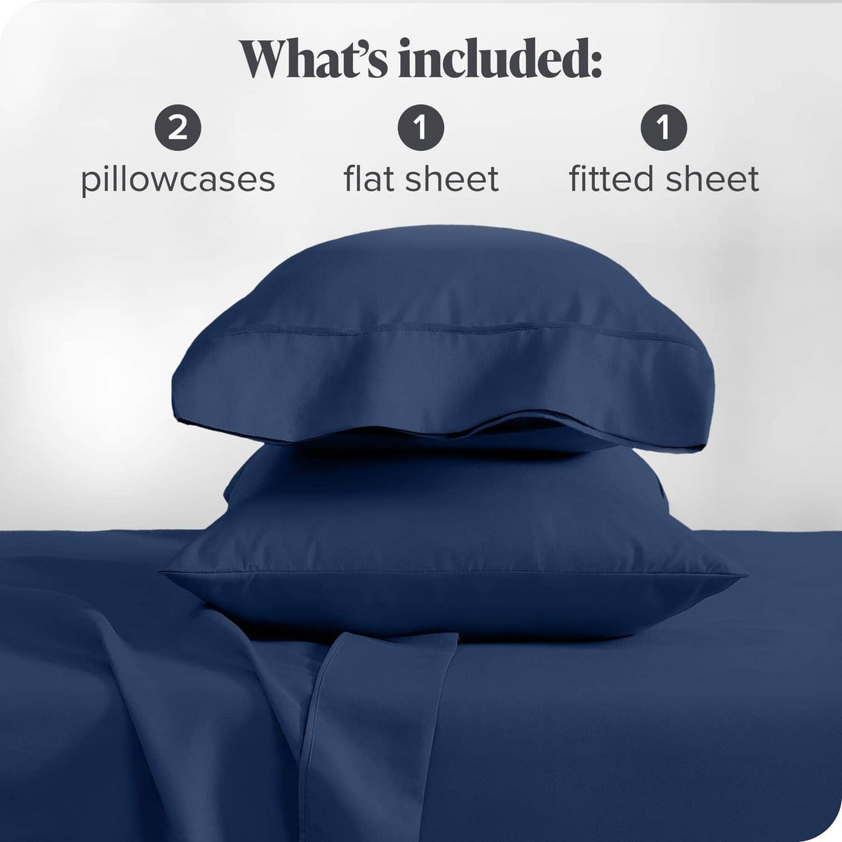 Dark blue microfiber bed linen set with folded pillowcases and flat plus fitted sheets