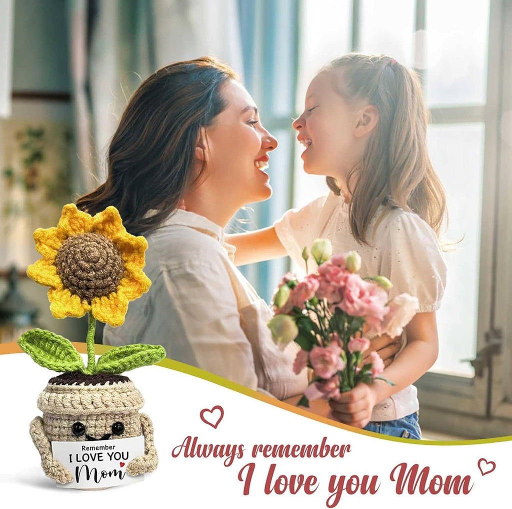 Crocheted sunflower gift in beige pot with yellow petals and green leaves, 'Remember I love you Mom' label