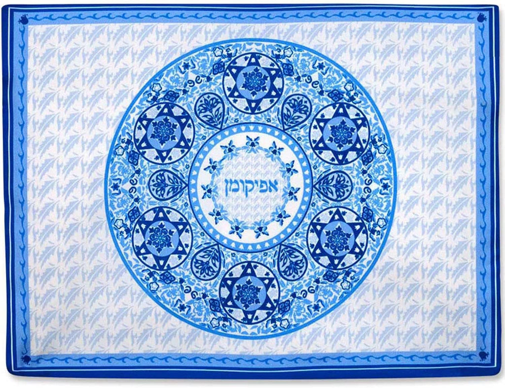 Blue-and-white square Passover table centerpiece with central circular medallion design