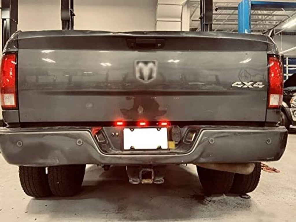 LED ID light bar on rear tailgate with three red lights and black housing