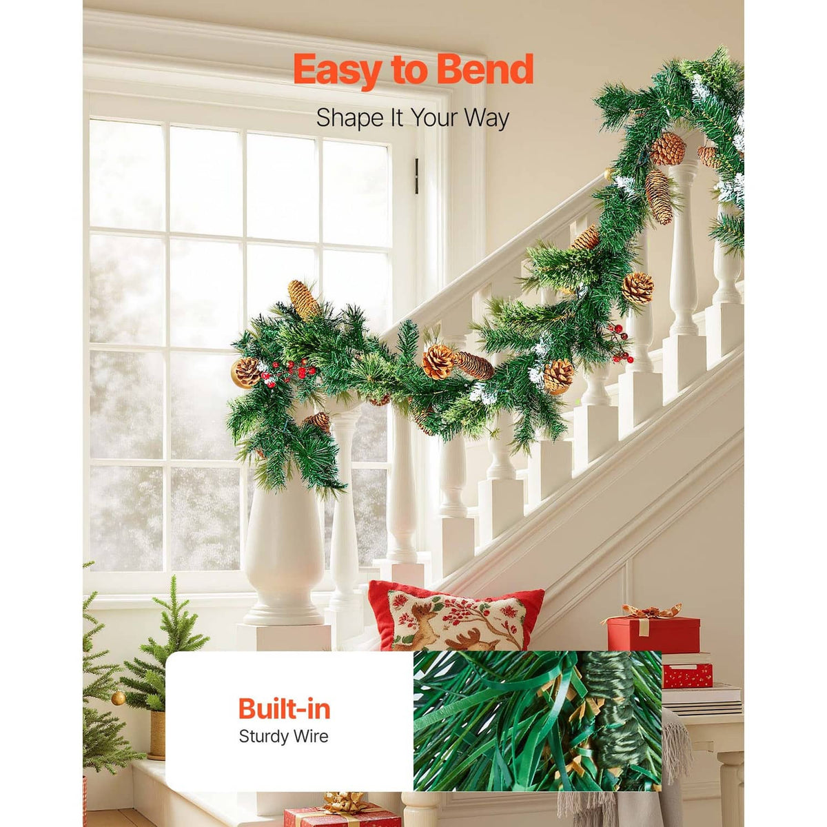 Christmas garland with pine needles, pinecones, and red berries along staircase railing