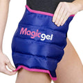 Reusable blue gel hip ice pack wrap with pink trim, held over hip area