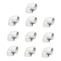 Set of white PVC 90° elbow couplings with FIPT threads, 1-inch size.