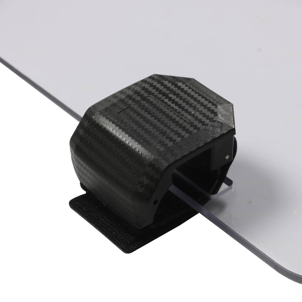 Carbon-fiber style flip latch on clear windshield with black mounting bracket