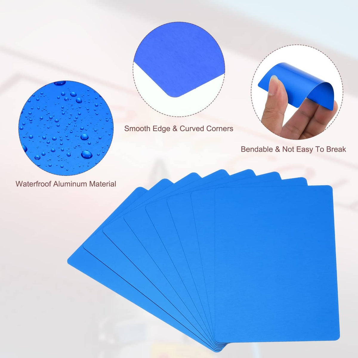Blue metal business cards with water-resistant finish, smooth edges and curved corners.