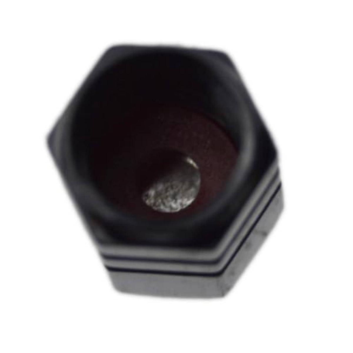 Black valve stem cap interior, showing metal insert and threaded opening