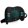 Black lumbar support pillow with teal grid pressure-relief pattern and side handle strap