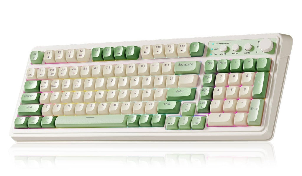 Gaming keyboard with cream keys and green keycaps, angled front view.