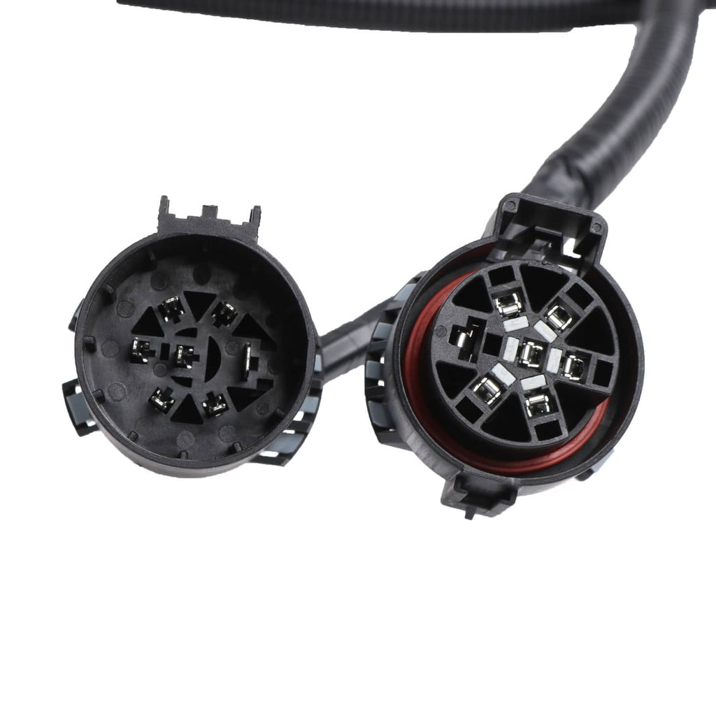 Two T-style connector housings with multi-pin terminals