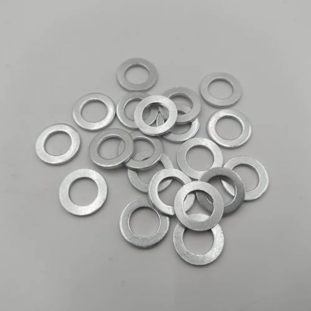 Silver engine oil drain plug crush washers, loose pile, flat round rings