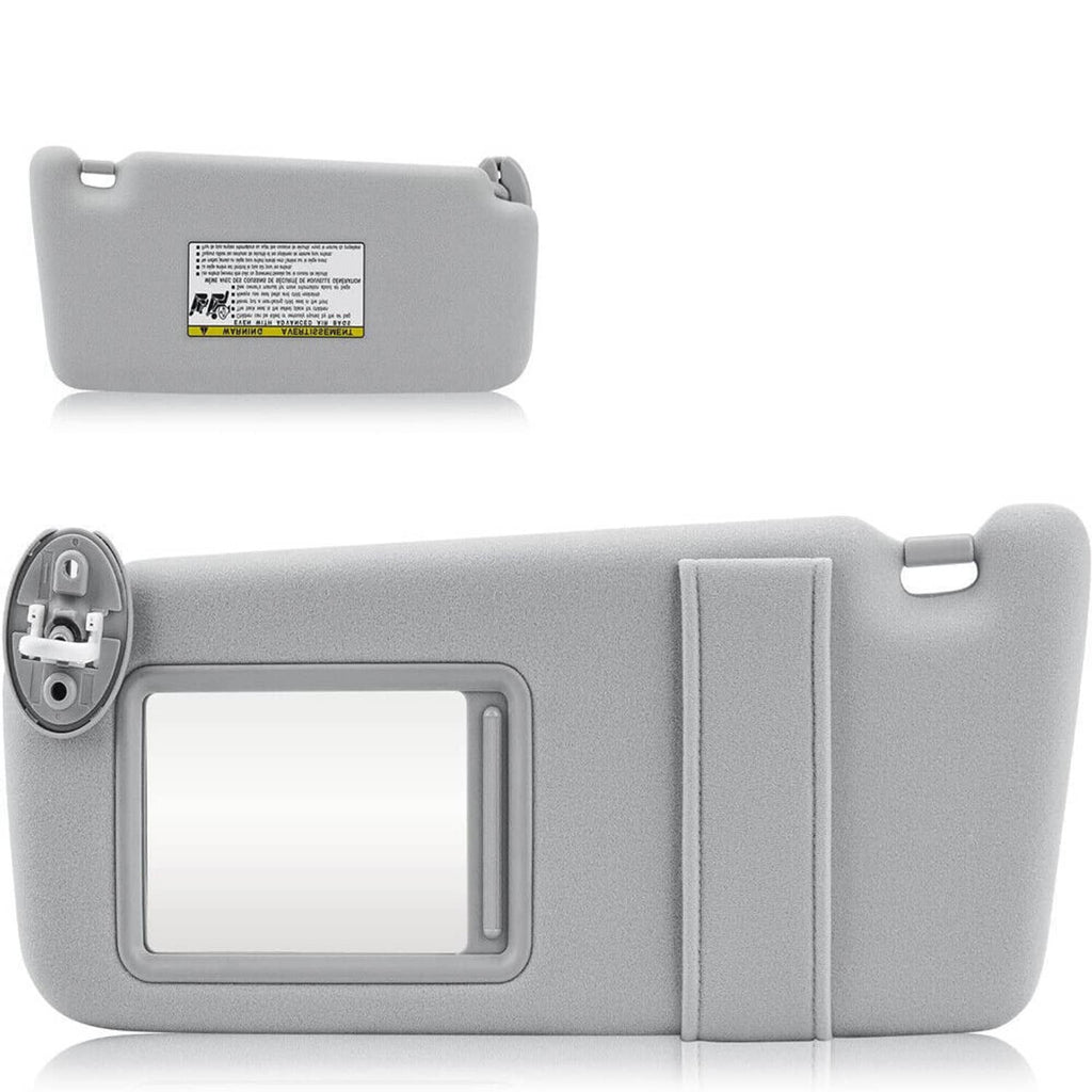 Left driver-side sun visor in light gray fabric with label on outer face