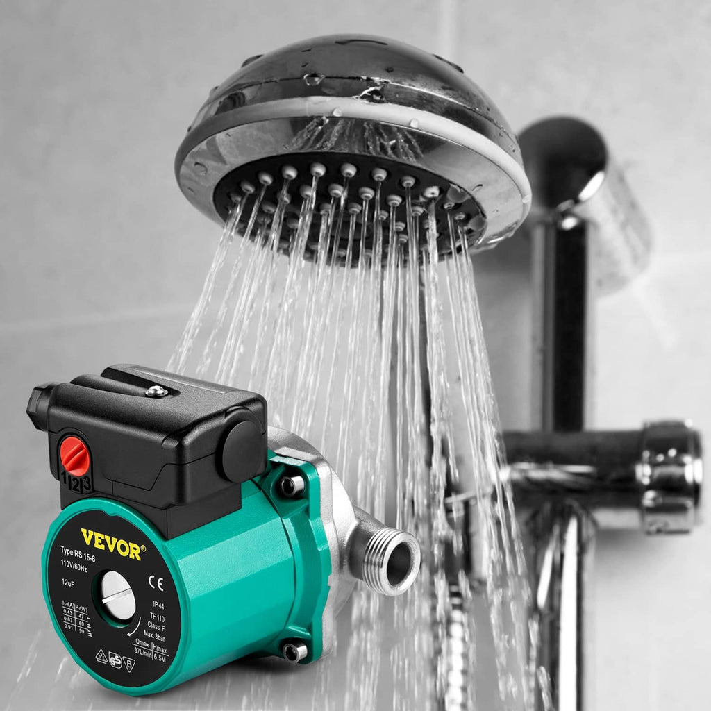 Hot water circulation pump spraying water, teal body with black control housing