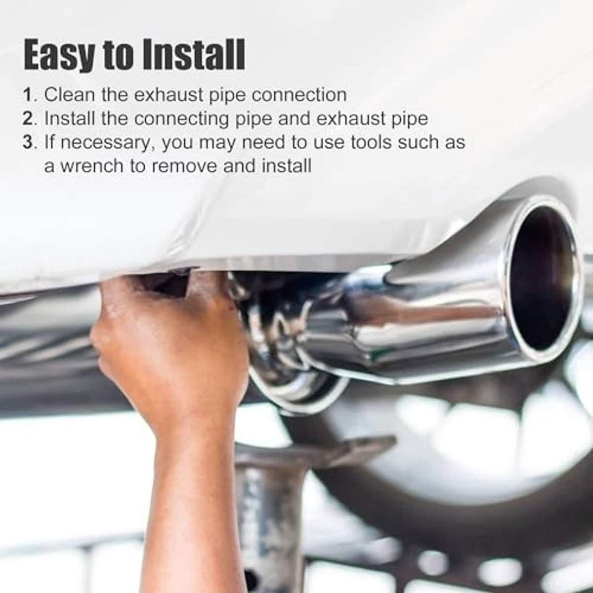 Stainless steel exhaust elbow being installed on a vehicle exhaust pipe connection