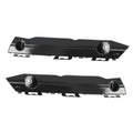 Front bumper bracket pair, black plastic with circular mounting inserts and tabs