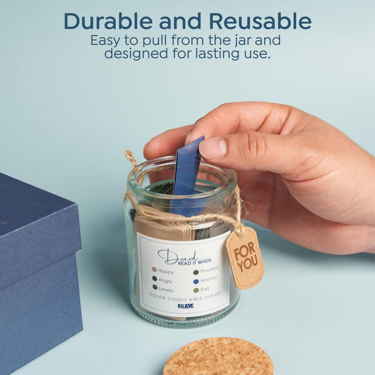 Glass Bible verse jar with pull-from lid and kraft 'for you' tag, held by a hand.