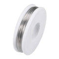 28AWG nichrome heating resistor wire, silver-toned, on white spool, 0.3mm